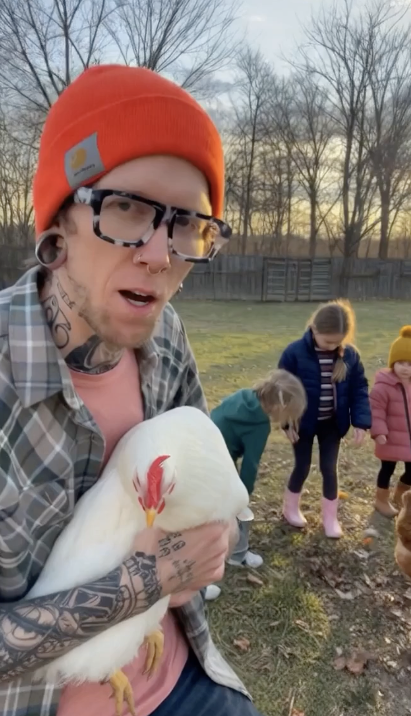 Ryan McLaughlin with chicken and family